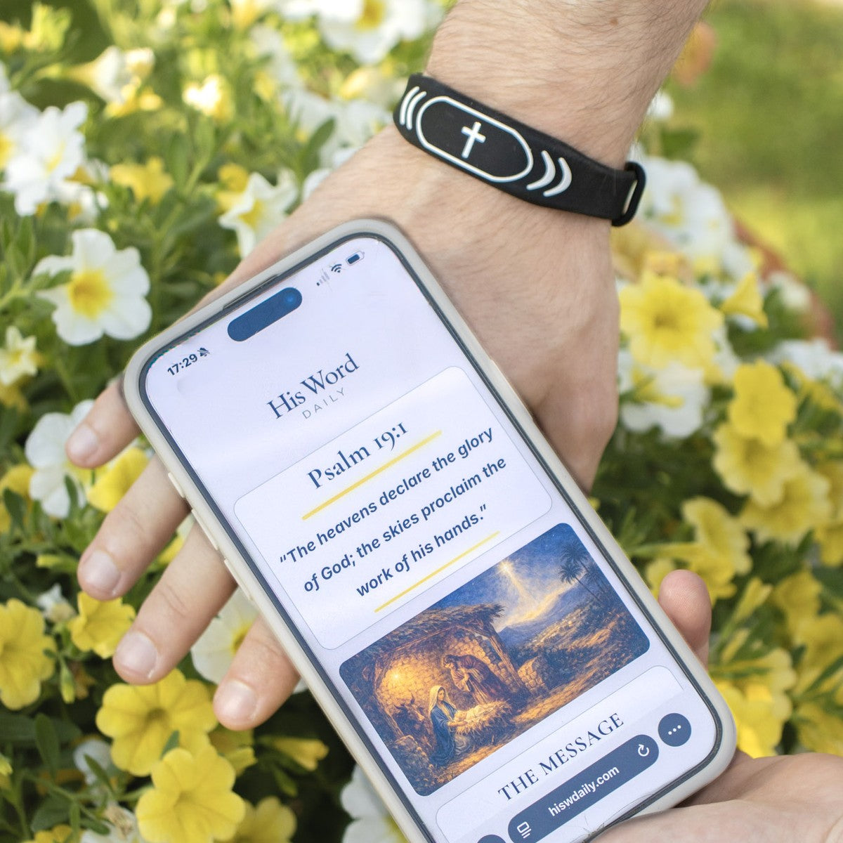 Bracelet on a wrist beside today’s Word